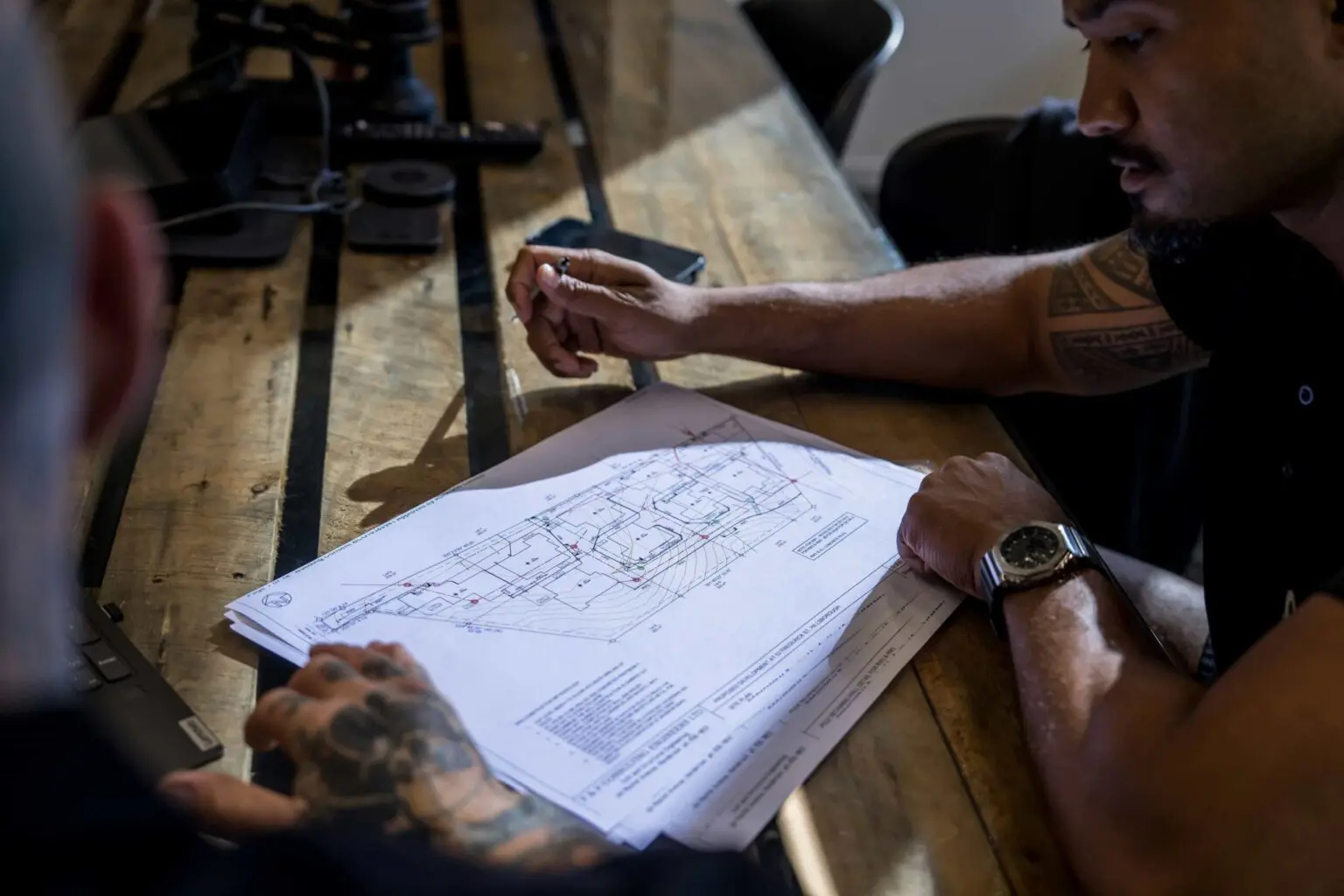 Going through driveway plans with a customer