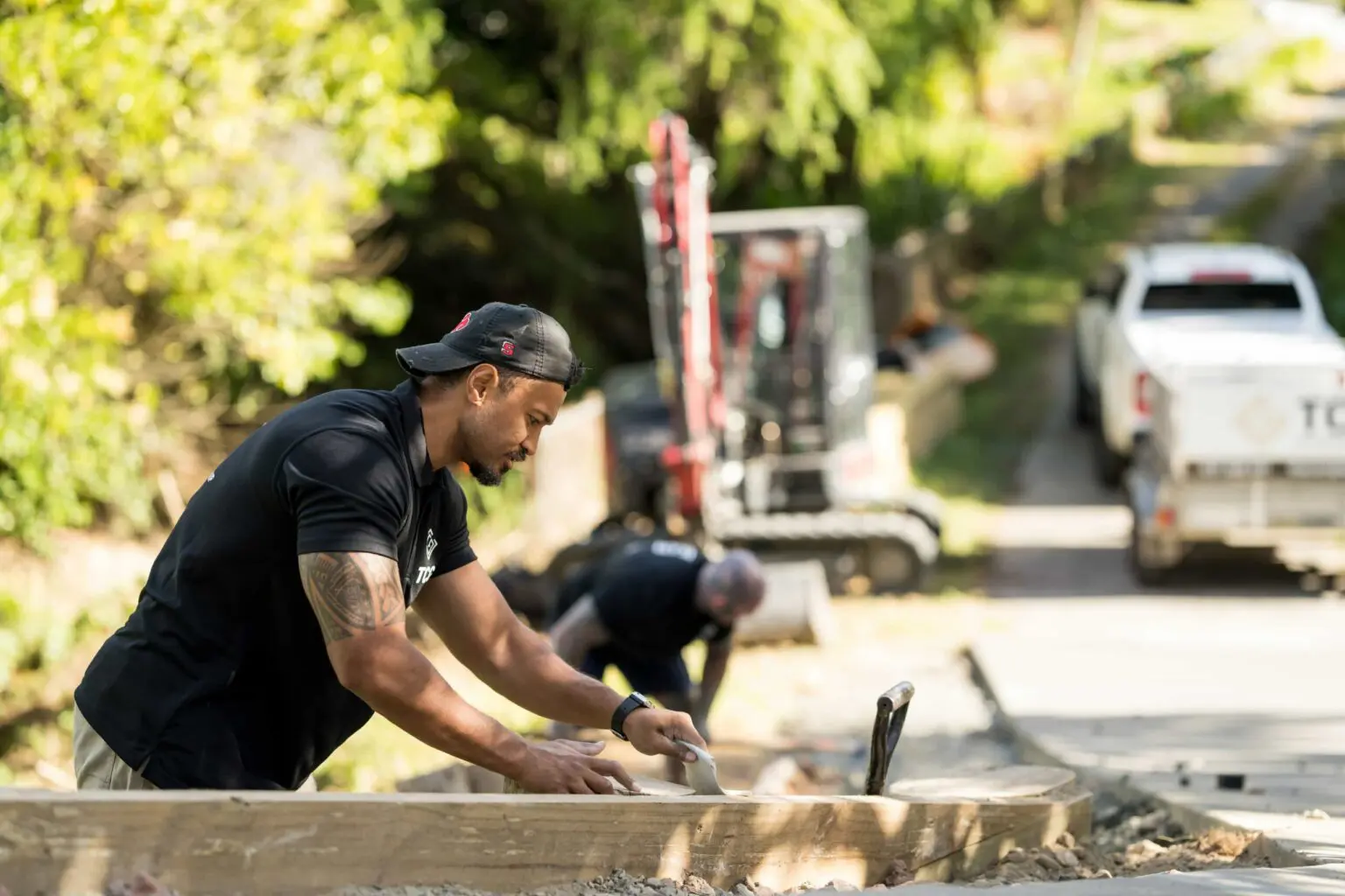 Setting timber boxing before a concrete driveway pour